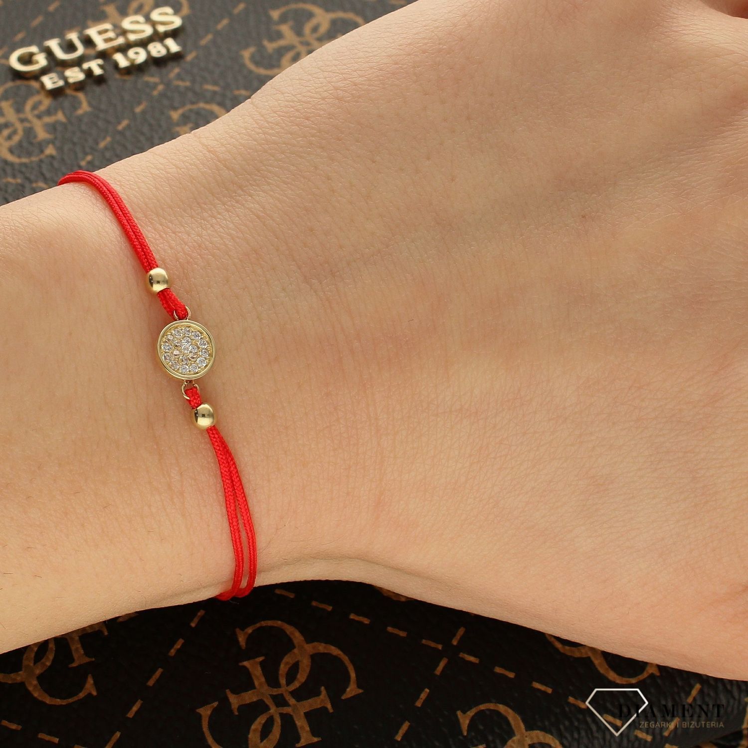 Złota bransoletka na sznurku z okrągłą zawieszką BR 6594 (1).jpg